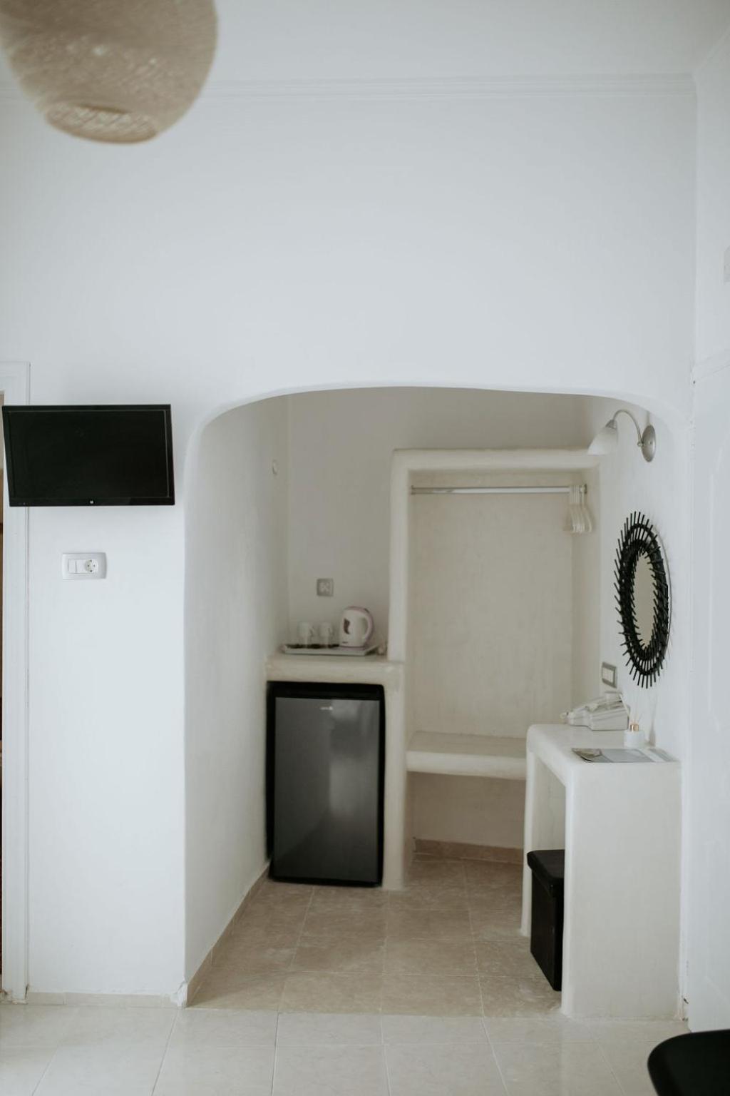 Hotel Thirasia Fira (Santorini) Quarto foto